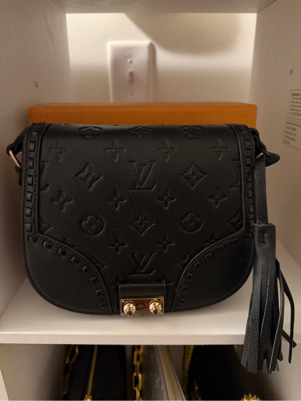 Black Embossed Monogram Crossbody with Tassel Accent